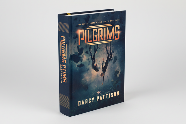 Use the provided cover for PILGRIMS to create a hardcover book..